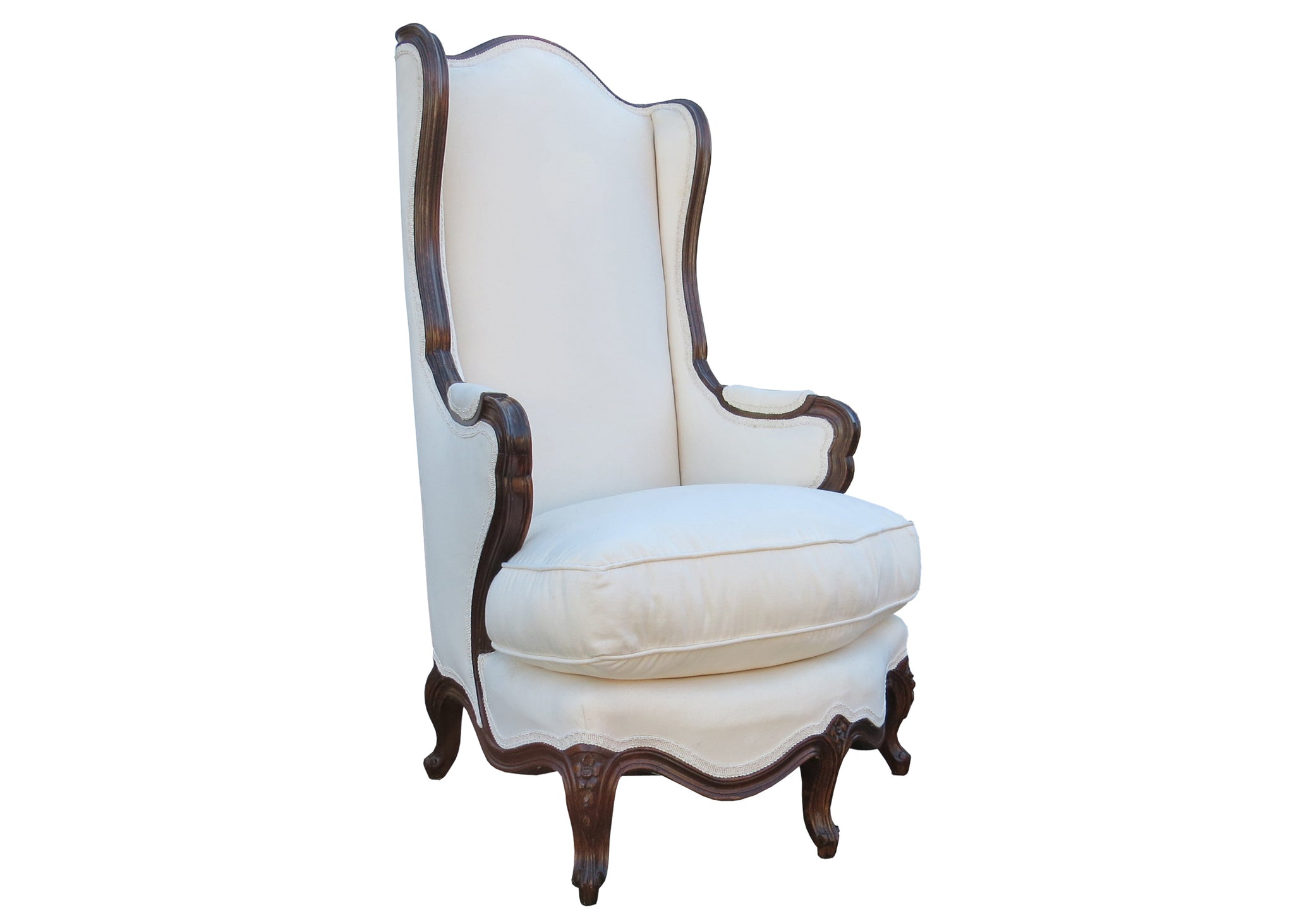 Antique French Louis XV style wingback chair.